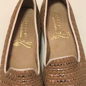 Women’s tan and silver aresole flats